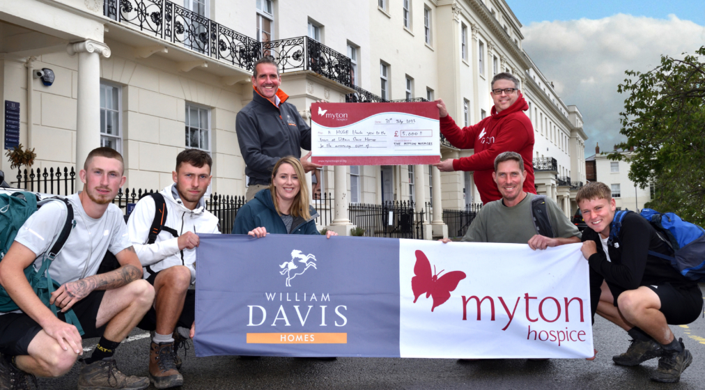 William Davis employees presenting Myton hospice with cheque for £5,000.